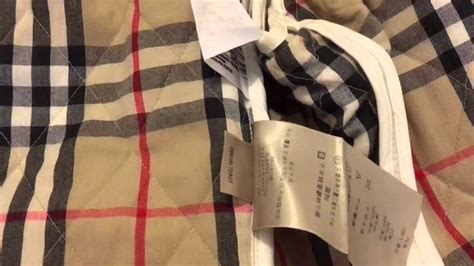 how to tell a fake burberry quilted jacket|real burberry coat.